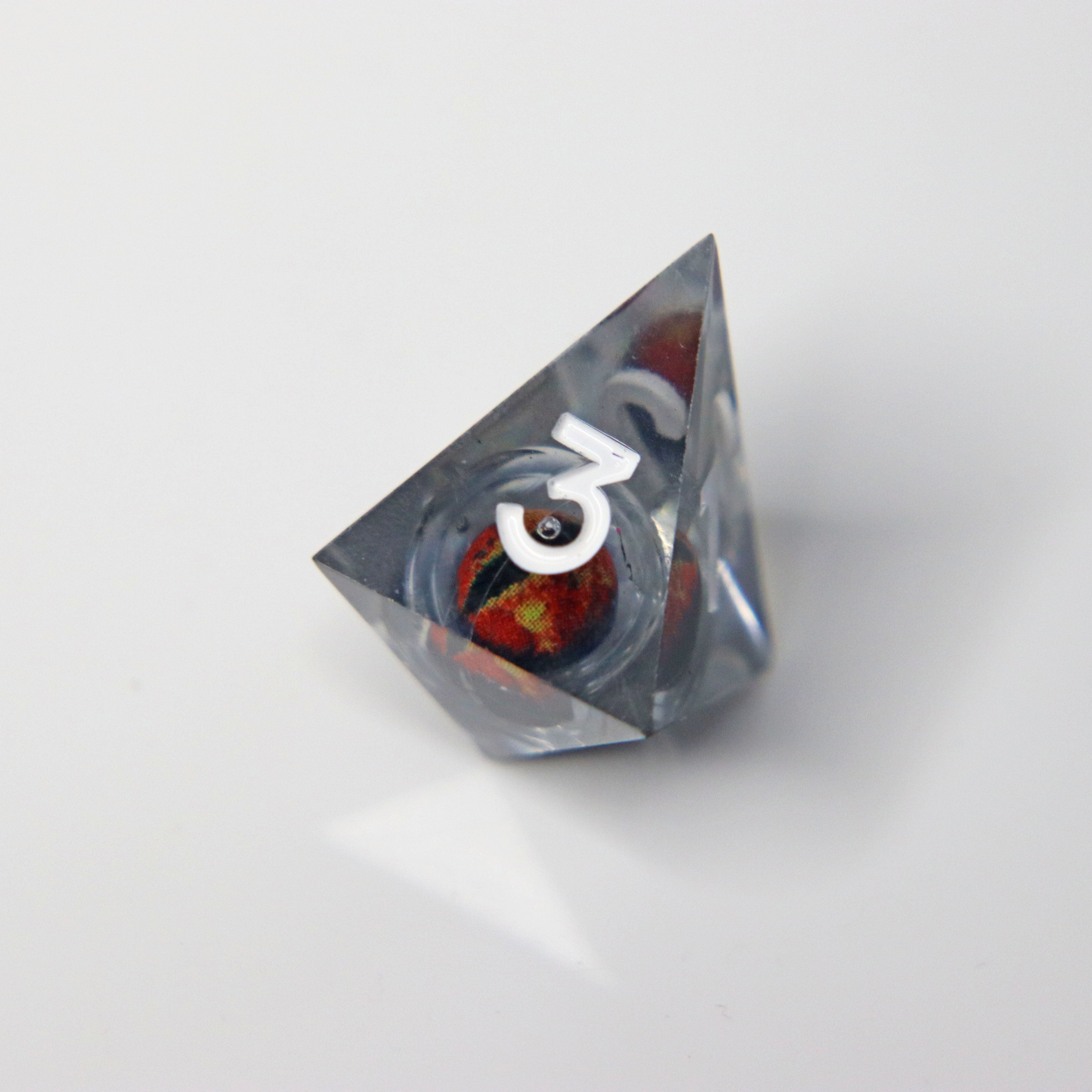 Eye of the Rust Dragon 7-Piece Liquid Core RPG Dice Set